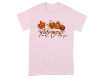 Pink t-shirt with a watercolor graphic of fall characters and the text "Fall Vibes".
