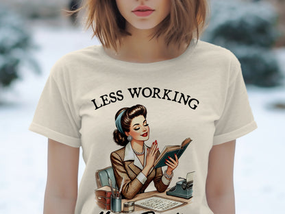 Cream t-shirt with retro illustration and text "Less Working".