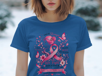 Blue t-shirt with pink breast cancer ribbon, butterflies, flowers, and inspirational text.