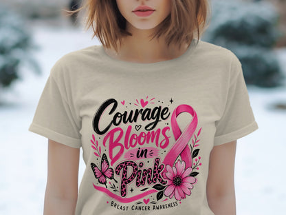 Cream t-shirt with pink and black "Courage Blooms in Pink" graphic and butterfly.