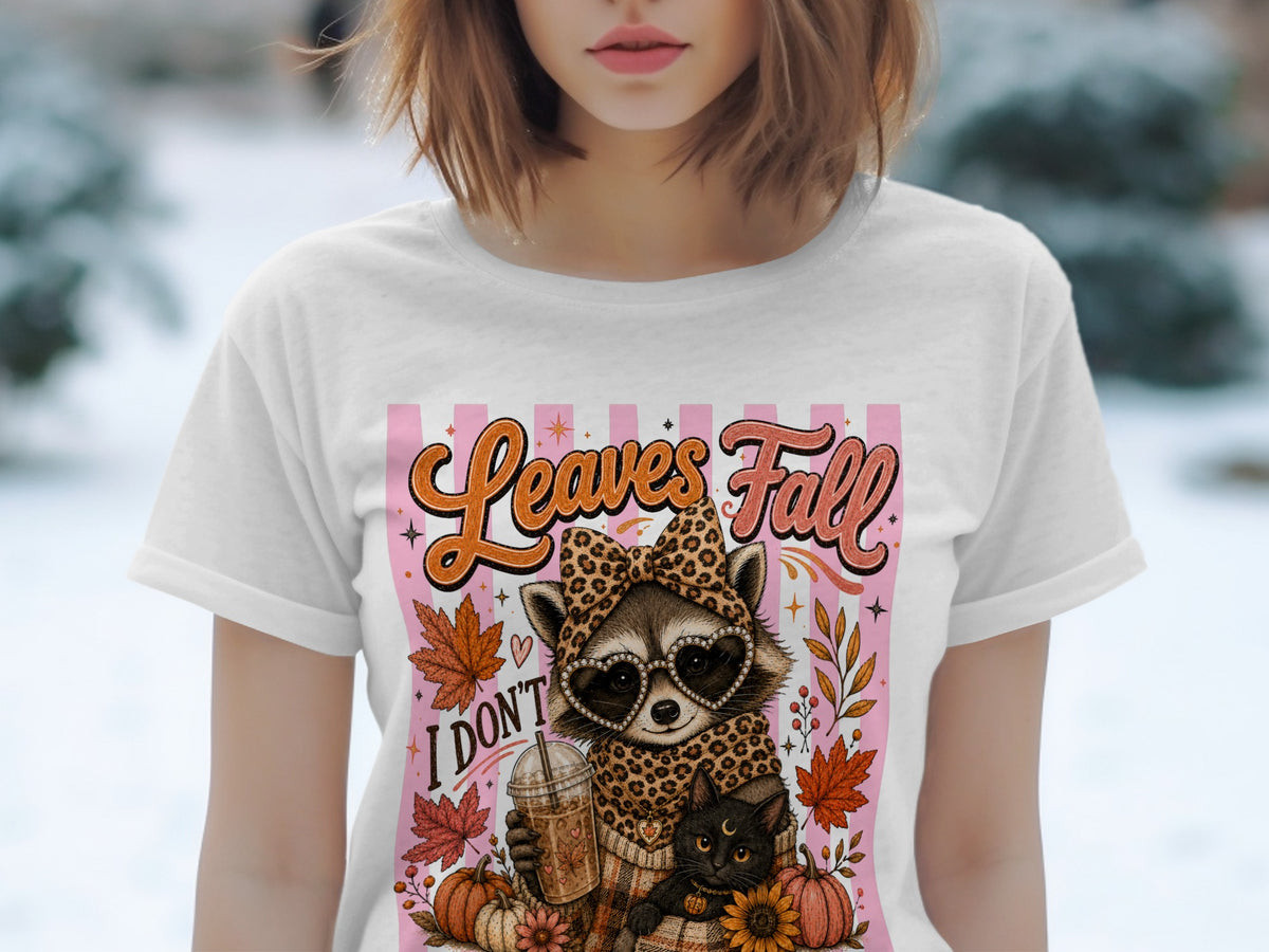 Raccoon with sunglasses and leopard print, holding coffee, with cat and pumpkins, "Leaves Fall" text.
