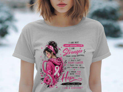 T-shirt graphic with a woman, pink ribbon, flowers, and inspirational text.