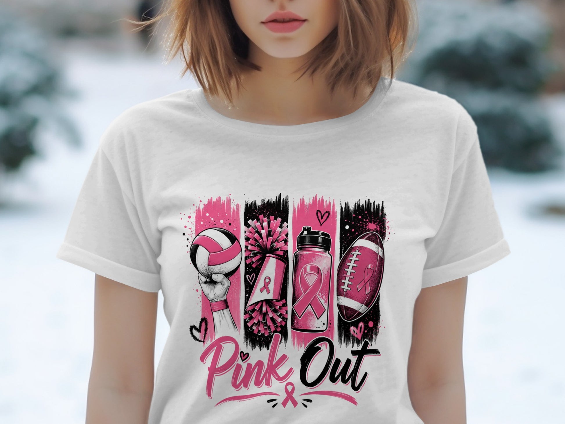 White t-shirt with "Pink Out" graphic featuring sports equipment and breast cancer ribbons.