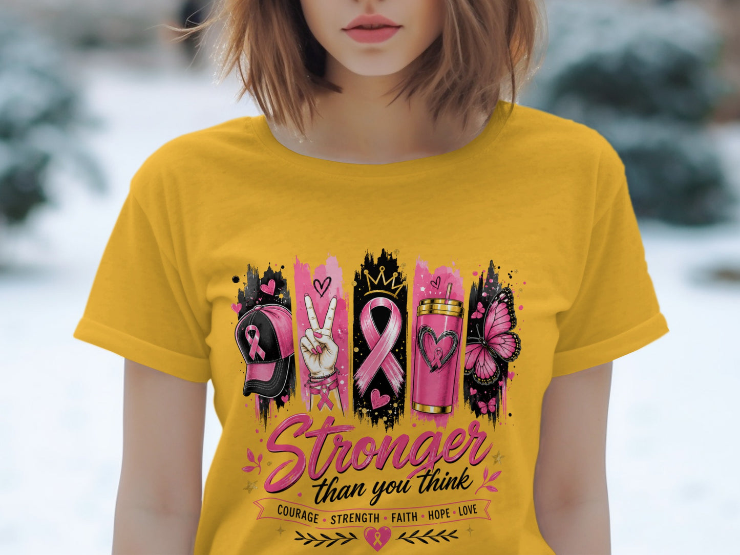Yellow t-shirt with breast cancer awareness graphic and text.