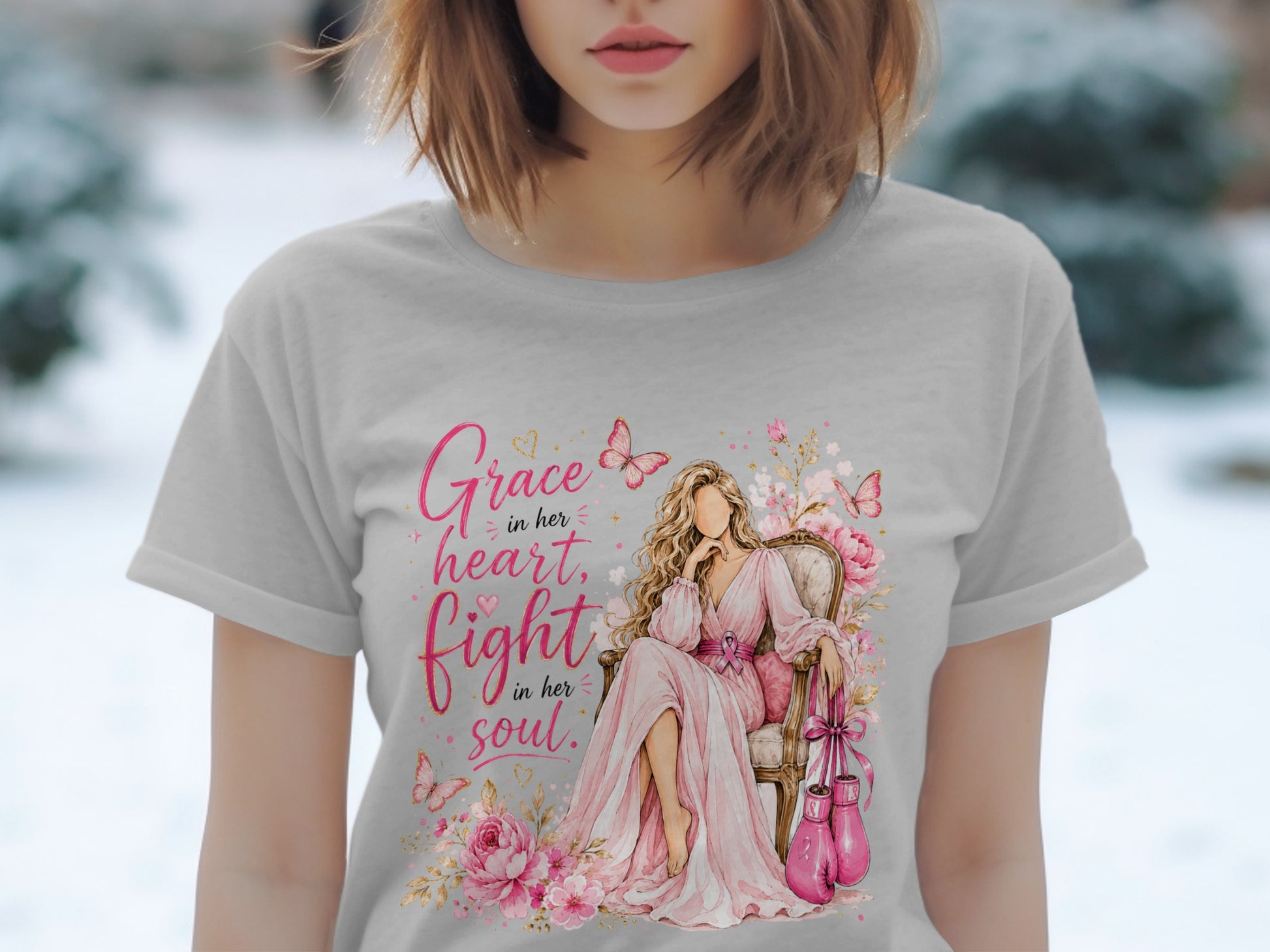 Woman in a pink dress with "Grace in her heart, fight in her soul" text and boxing gloves.