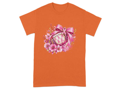 Orange t-shirt with football decorated with pink ribbons and flowers.