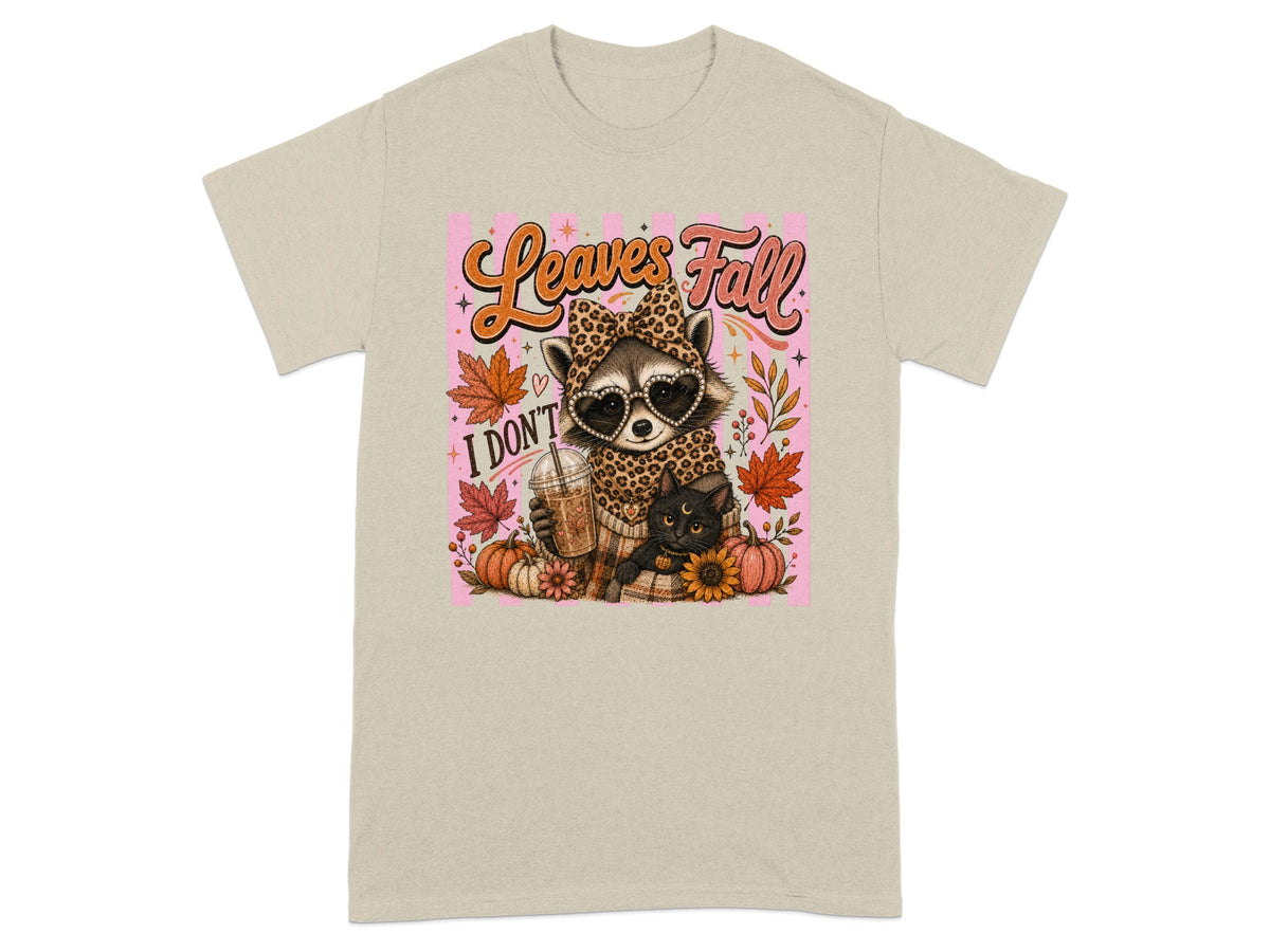 Raccoon in leopard print with heart sunglasses holding coffee; text "Leaves Fall I DON'T".