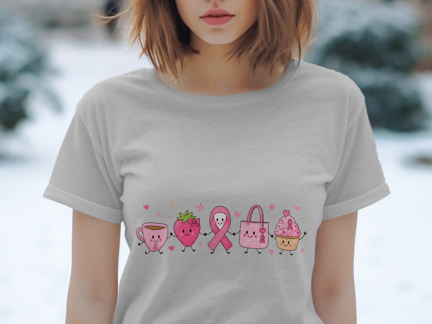 Gray t-shirt with a row of kawaii cartoon characters and pink breast cancer ribbons.