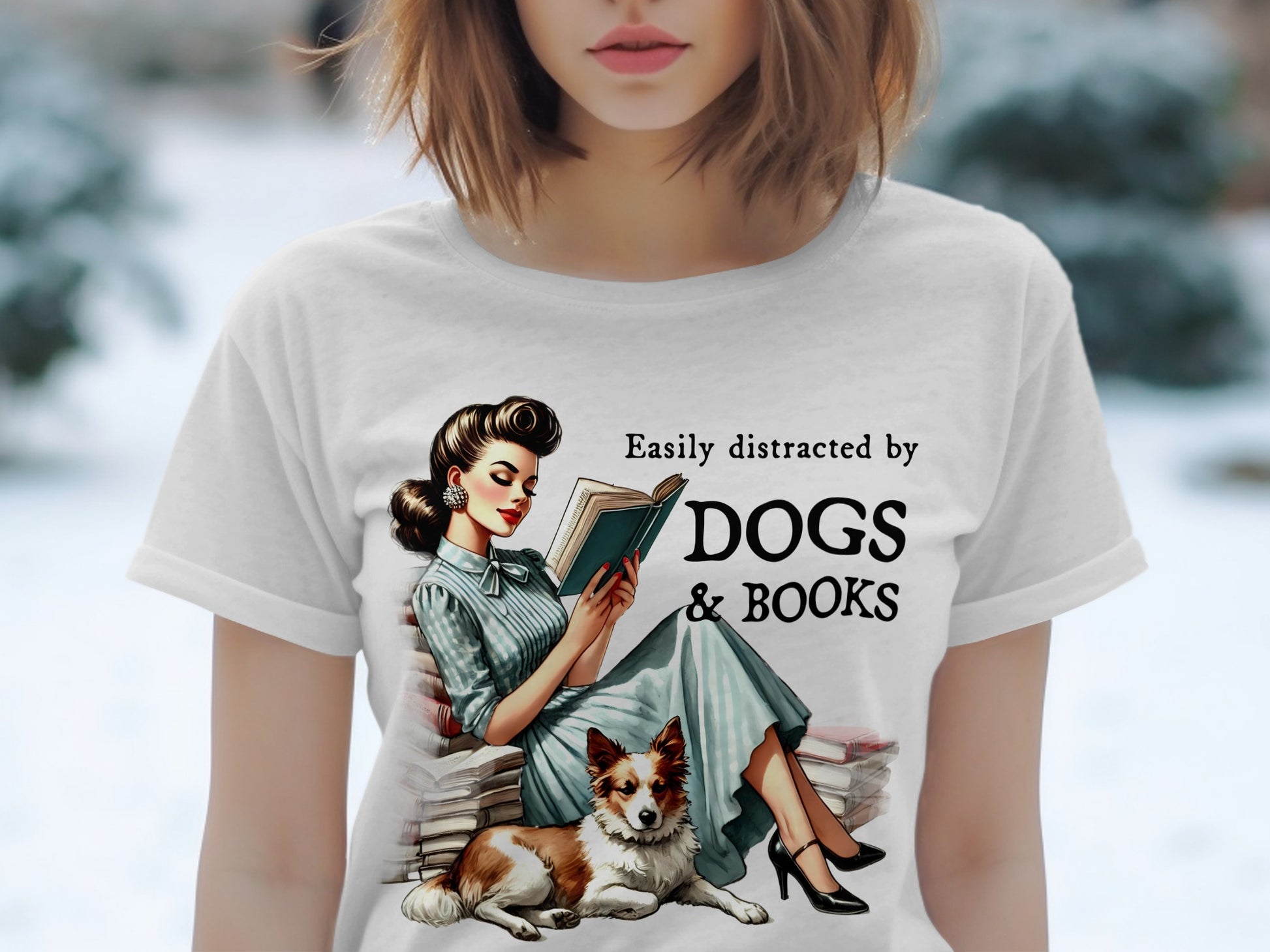 Woman reading book next to dog with text "Easily distracted by DOGS & BOOKS".