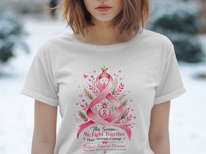 White t-shirt with pink ribbon design and text about fighting breast cancer.