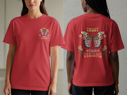 Red t-shirt with butterfly graphic and "Trust Your Visions" text.