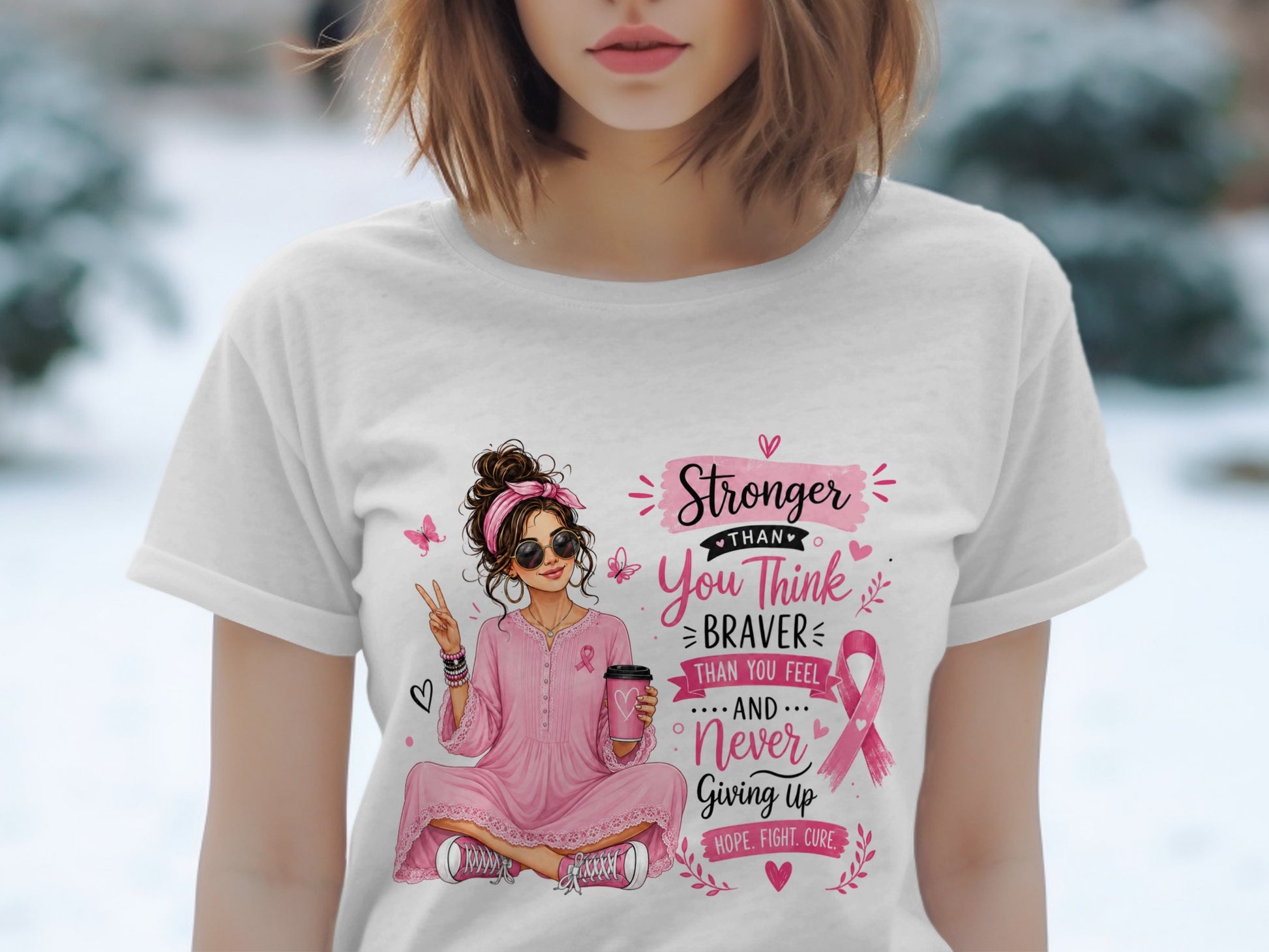 Graphic tee with "Stronger Than You Think" text and a woman holding a coffee cup.