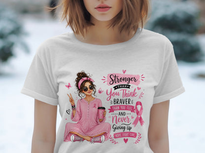 Graphic tee with "Stronger Than You Think" text and a woman holding a coffee cup.
