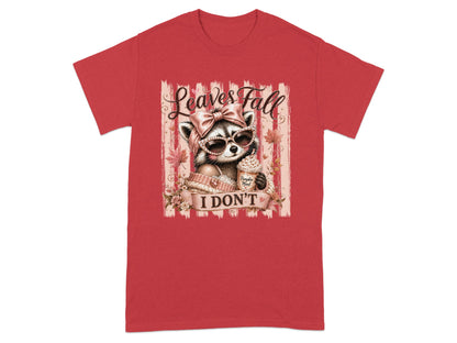 Raccoon in sunglasses holding coffee, "Leaves Fall I Don't" text.