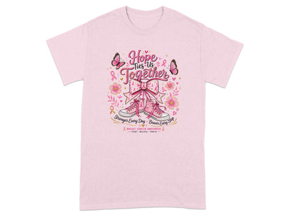 Pink t-shirt with "Hope Ties Us Together" and breast cancer awareness graphics.