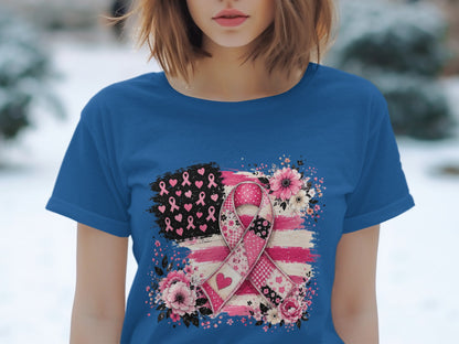 Blue t-shirt with a pink ribbon and floral design on a distressed American flag.