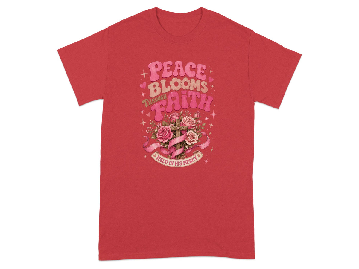 Red t-shirt with "Peace Blooms Through Faith" and a cross with roses.