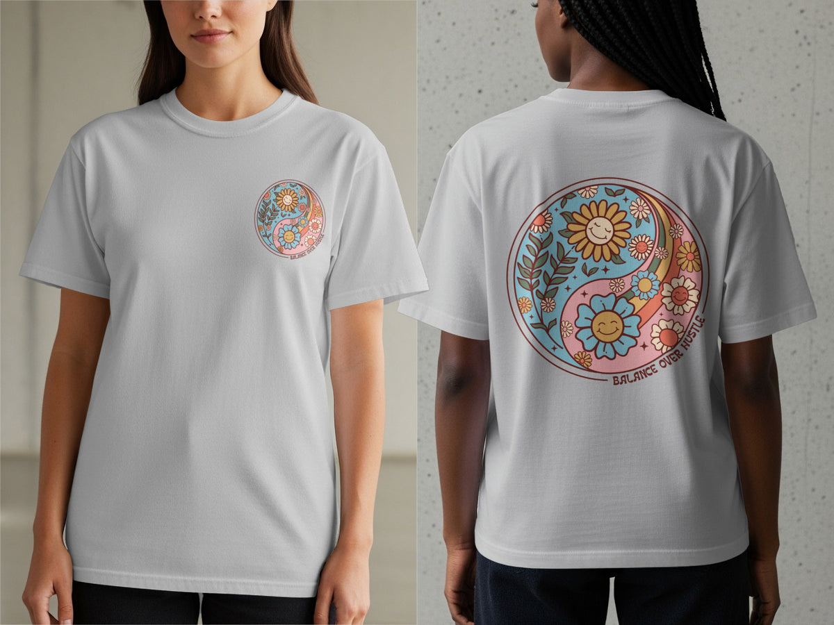 Light gray t-shirt featuring a retro floral yin-yang graphic with the text Balance Over Hustle.