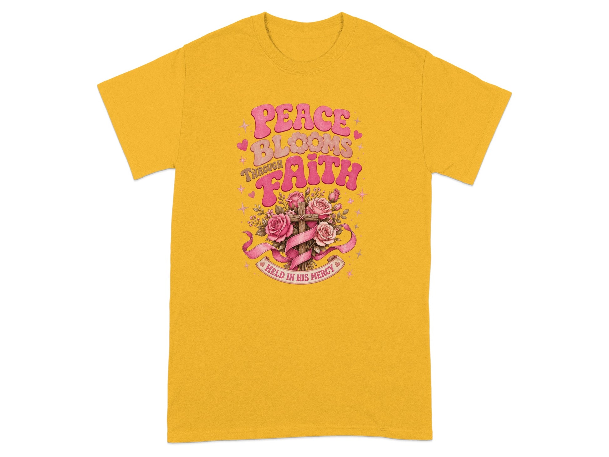Yellow t-shirt with "Peace Blooms Through Faith Held in His Mercy" text and floral cross design.