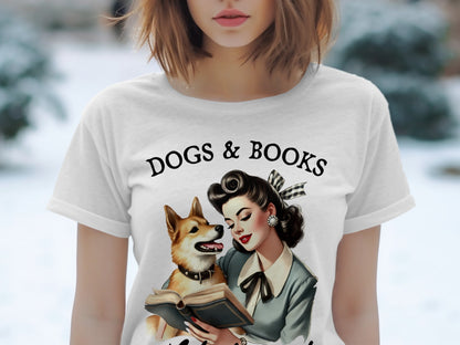 White t-shirt with "DOGS & BOOKS" text and retro illustration of woman and dog reading.