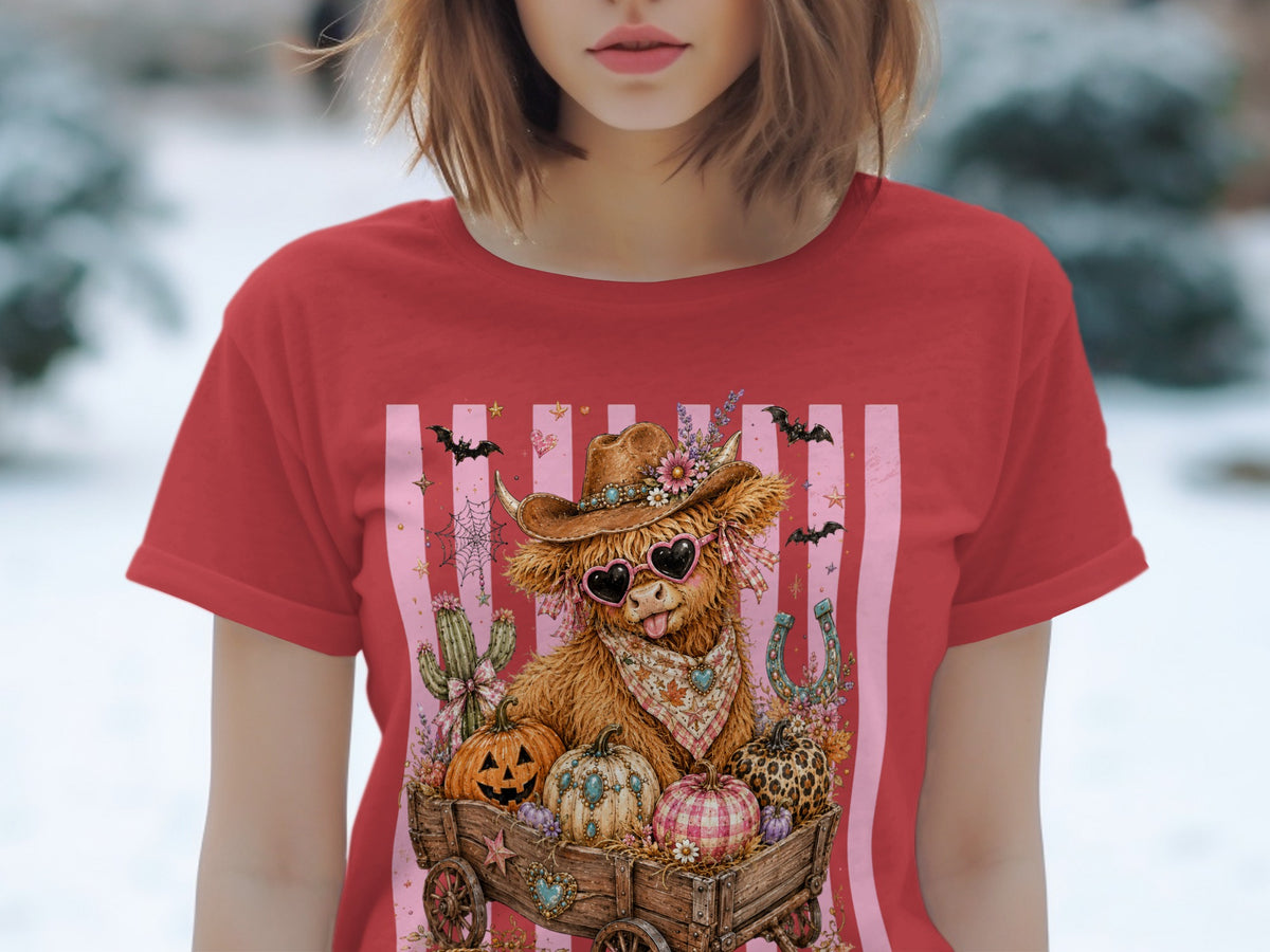 Highland cow with heart sunglasses in a wagon full of pumpkins.