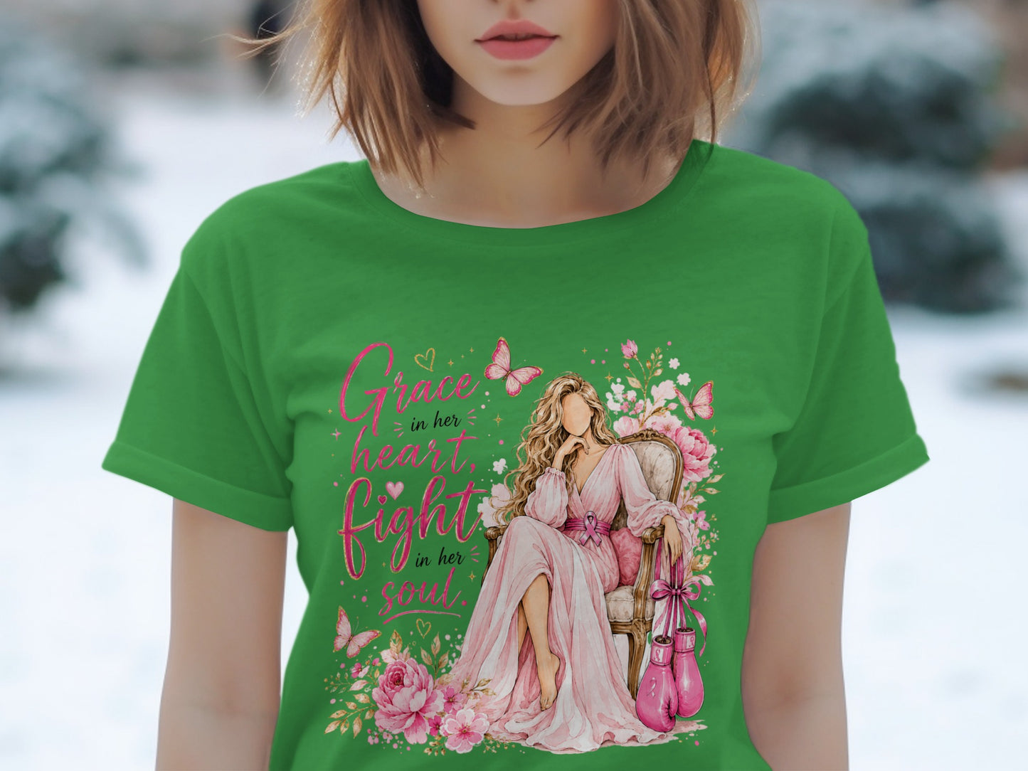 Green t-shirt with "Grace in her heart, Fight in her soul" text and illustration.