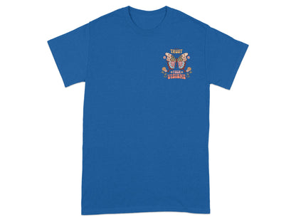 Blue t-shirt with a butterfly graphic and text "Trust Your Visions".