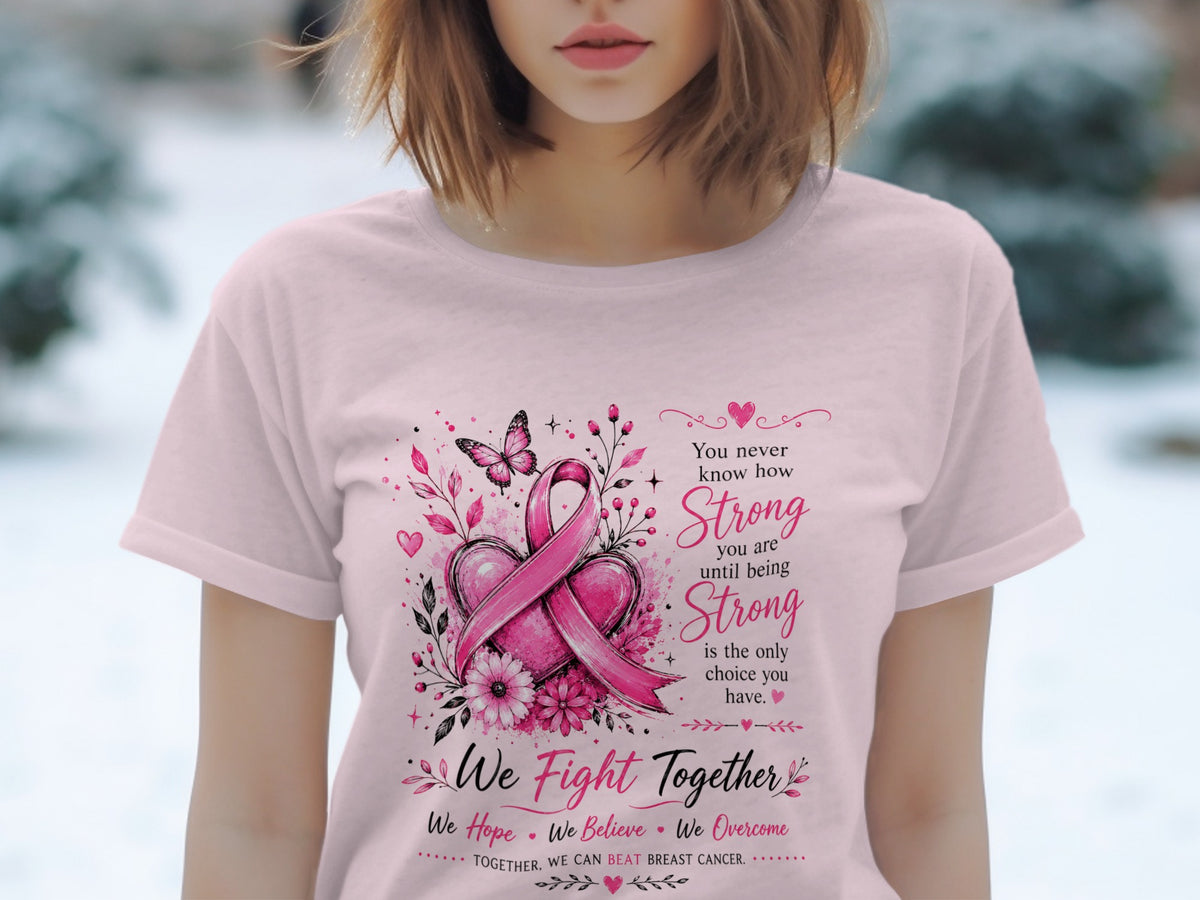 Pink t-shirt with pink ribbon, heart, flowers, butterfly and text "We Fight Together".