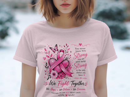 Pink t-shirt with pink ribbon, heart, flowers, butterfly and text "We Fight Together".