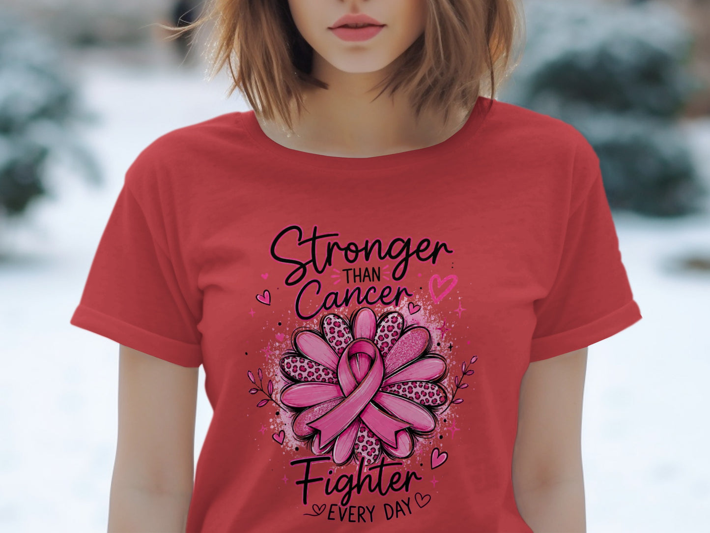 Red t-shirt with "Stronger Than Cancer Fighter Every Day" text and a pink ribbon flower.