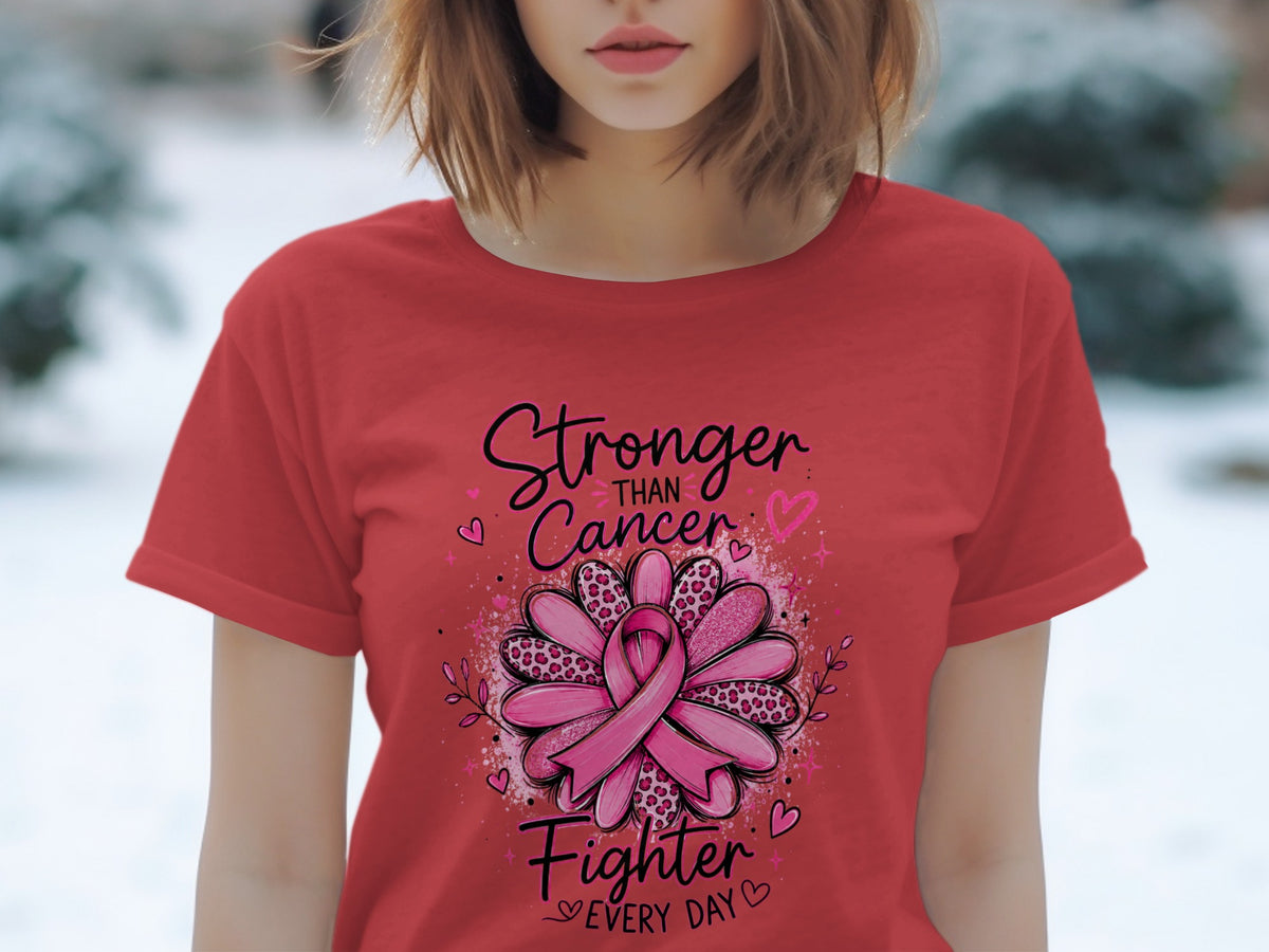 Red t-shirt with "Stronger Than Cancer Fighter Every Day" text and a pink ribbon flower.