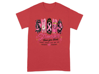 Red t-shirt with "Stronger than you think" and symbols for breast cancer awareness.