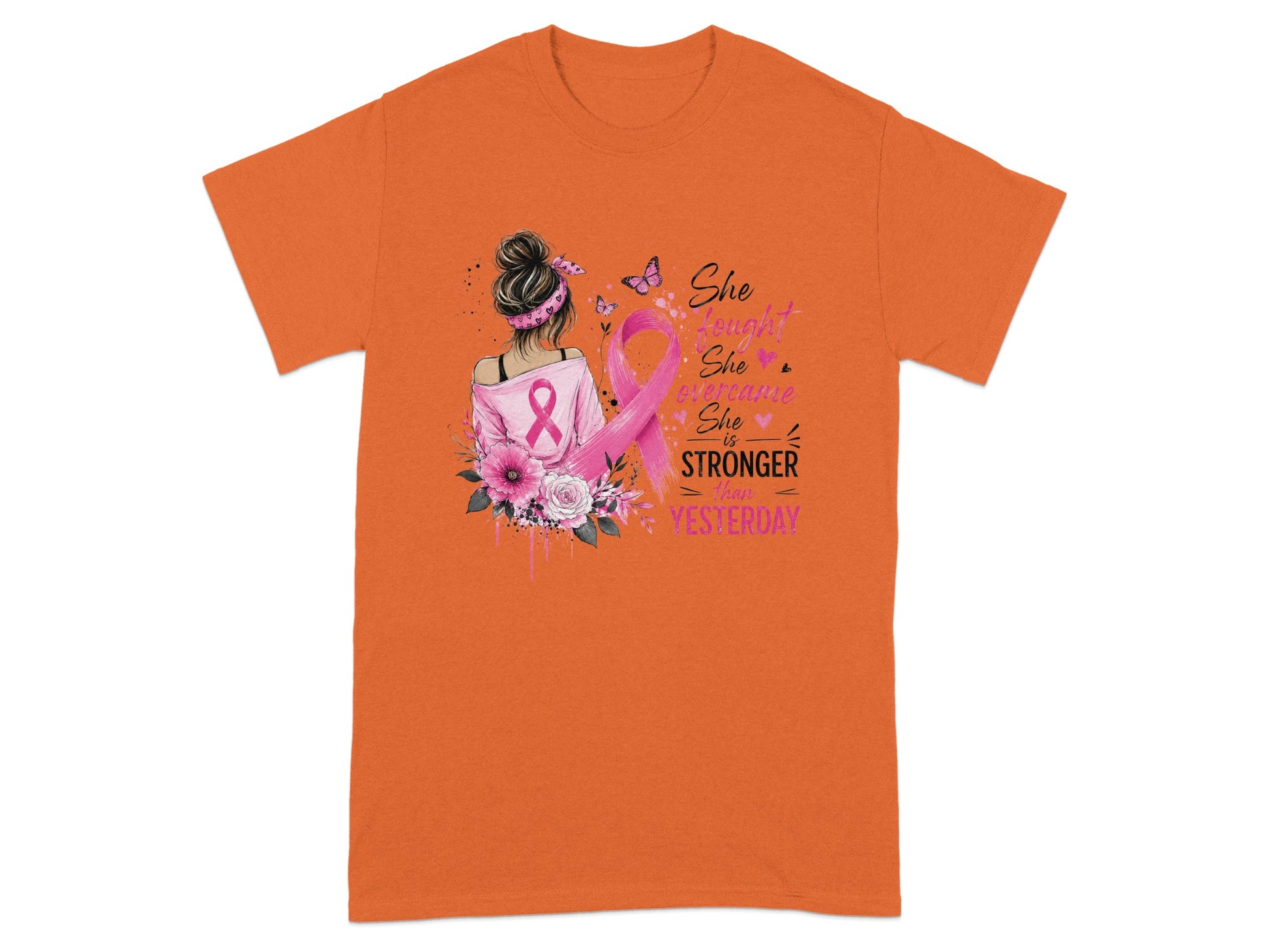 T-shirt with pink breast cancer ribbon, flowers, and text: "She fought, she overcame, she is stronger than yesterday."