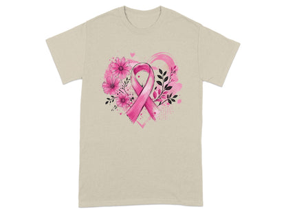 Pink breast cancer ribbon with floral accents on a light tan t-shirt.
