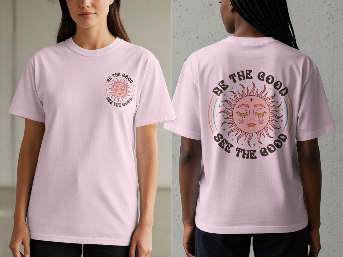 Pink t-shirt with a sun graphic and text "Be the Good See the Good".