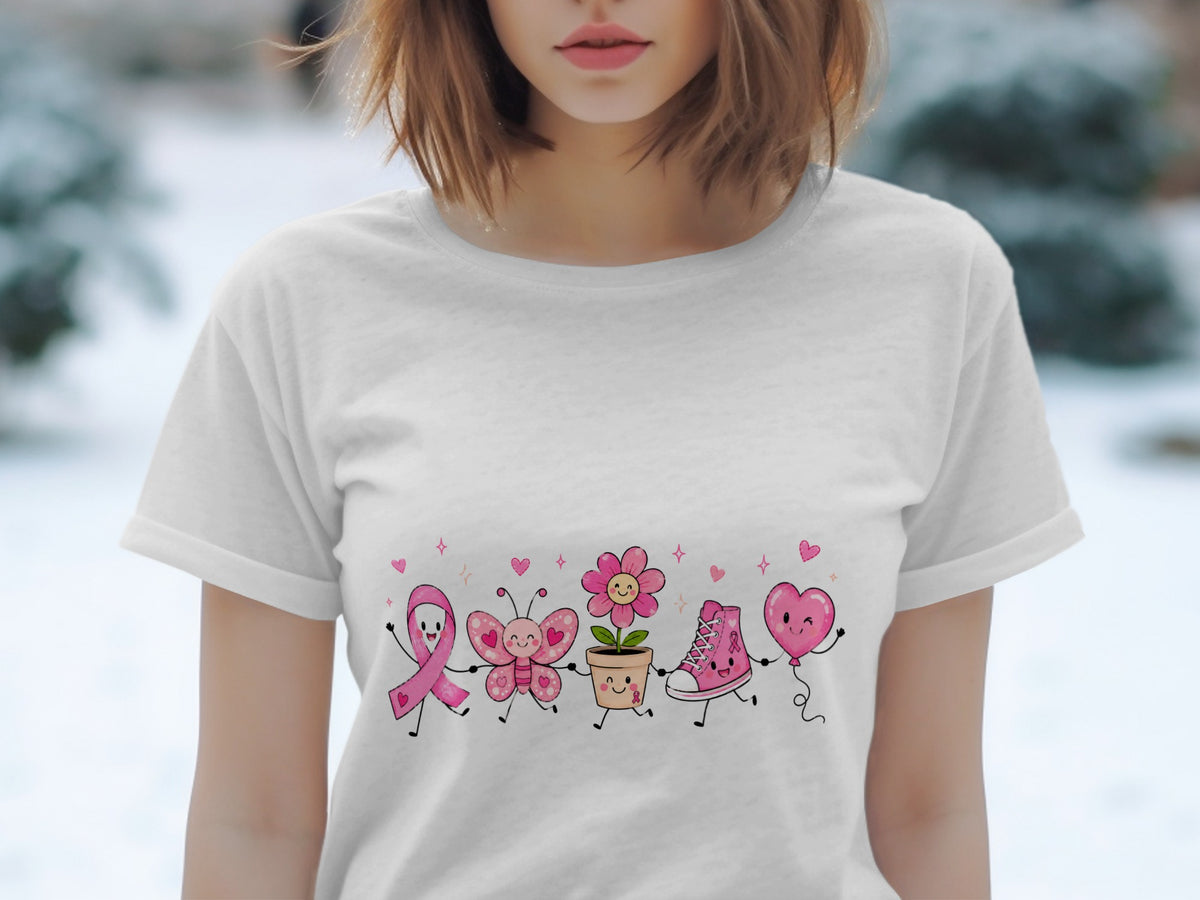 White t-shirt with a cartoon graphic of pink ribbon, butterfly, flower, shoe, and heart balloon.