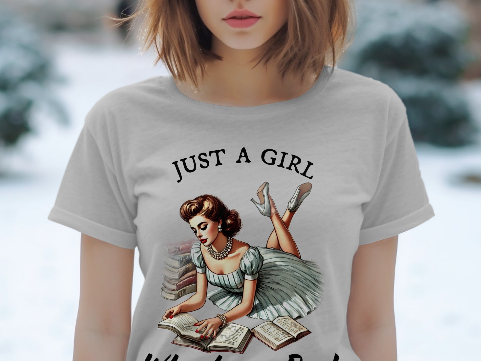 "Just a girl" text above vintage woman reading books on t-shirt