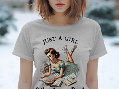 "Just a girl" text above vintage woman reading books on t-shirt