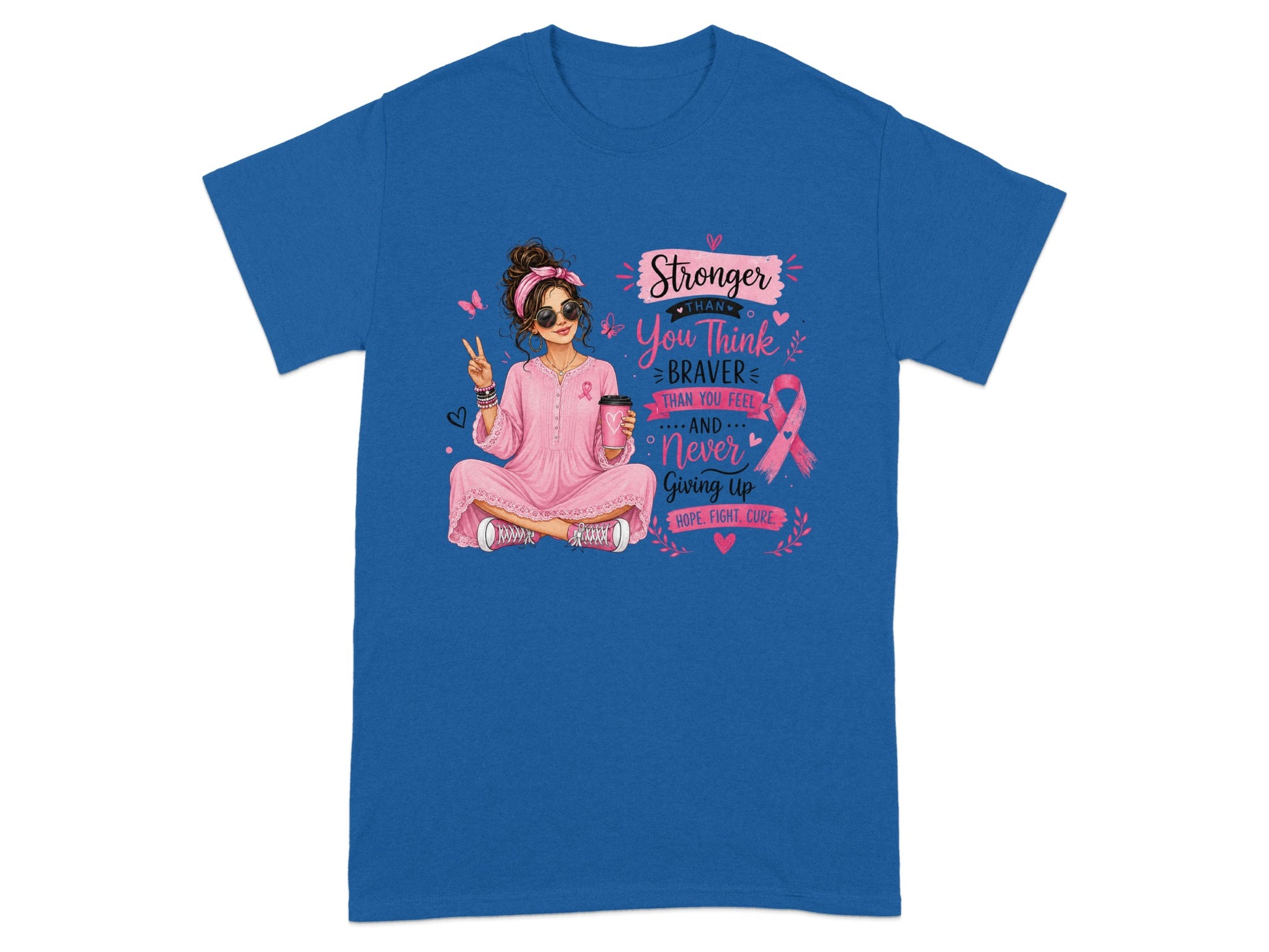 Woman in pink pajamas with breast cancer ribbon, holding coffee, "Stronger Than You Think" message.
