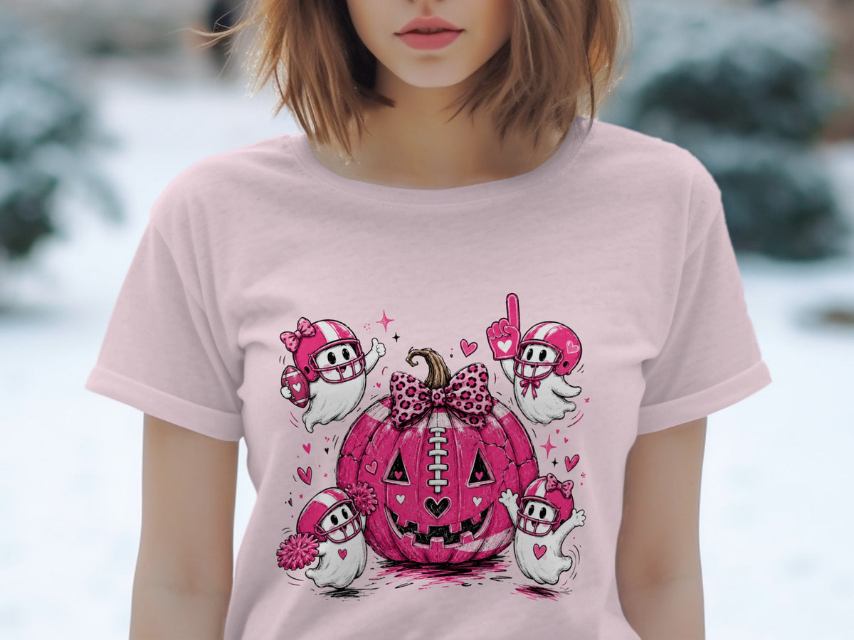 Pink pumpkin and four football-themed ghosts with helmets and hearts on a light pink shirt.