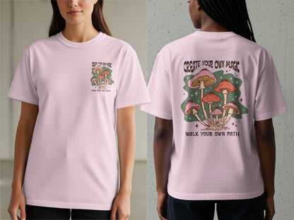 Pink t-shirt with mushrooms and text "Create Your Own Magic, Walk Your Own Path".