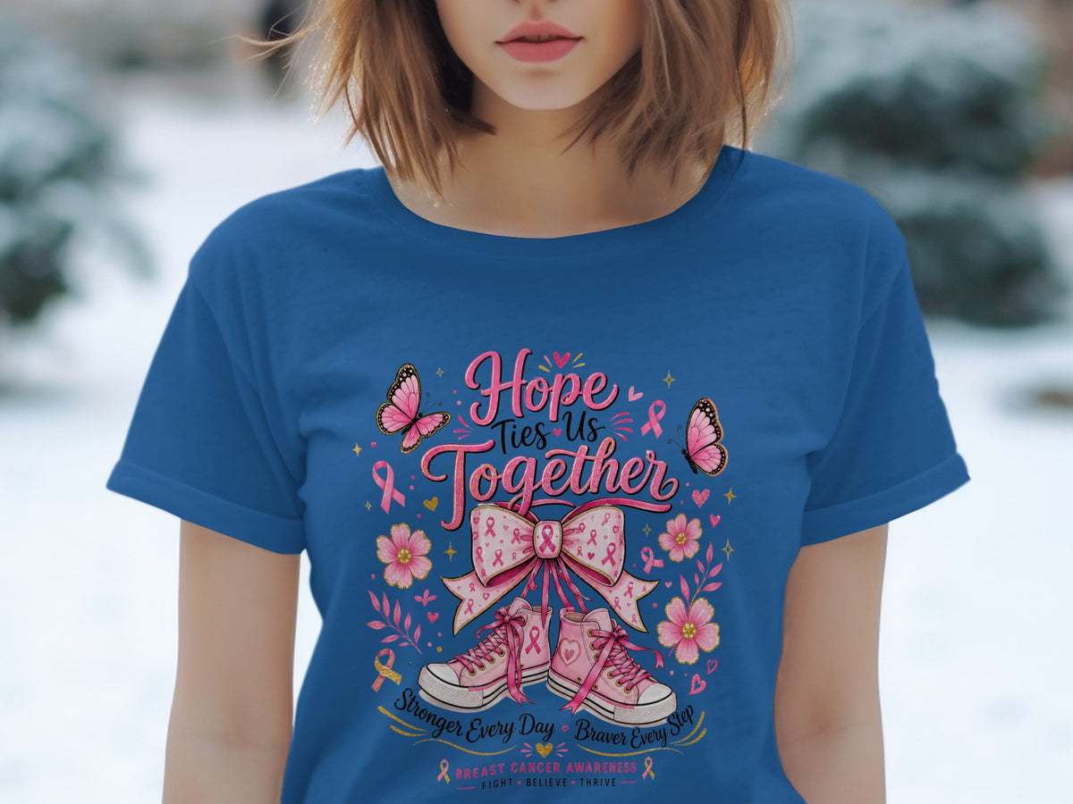 Blue t-shirt with "Hope Ties Us Together" text, pink ribbon, butterflies, flowers, and sneakers.