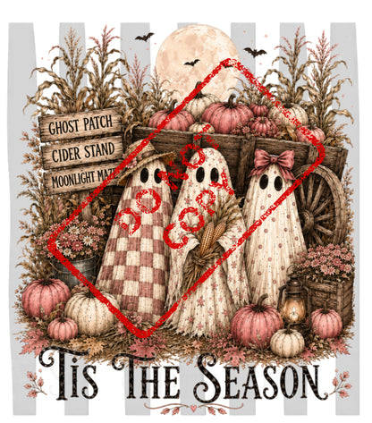 Three cartoon ghosts stand near a wagon filled with pumpkins and corn stalks.