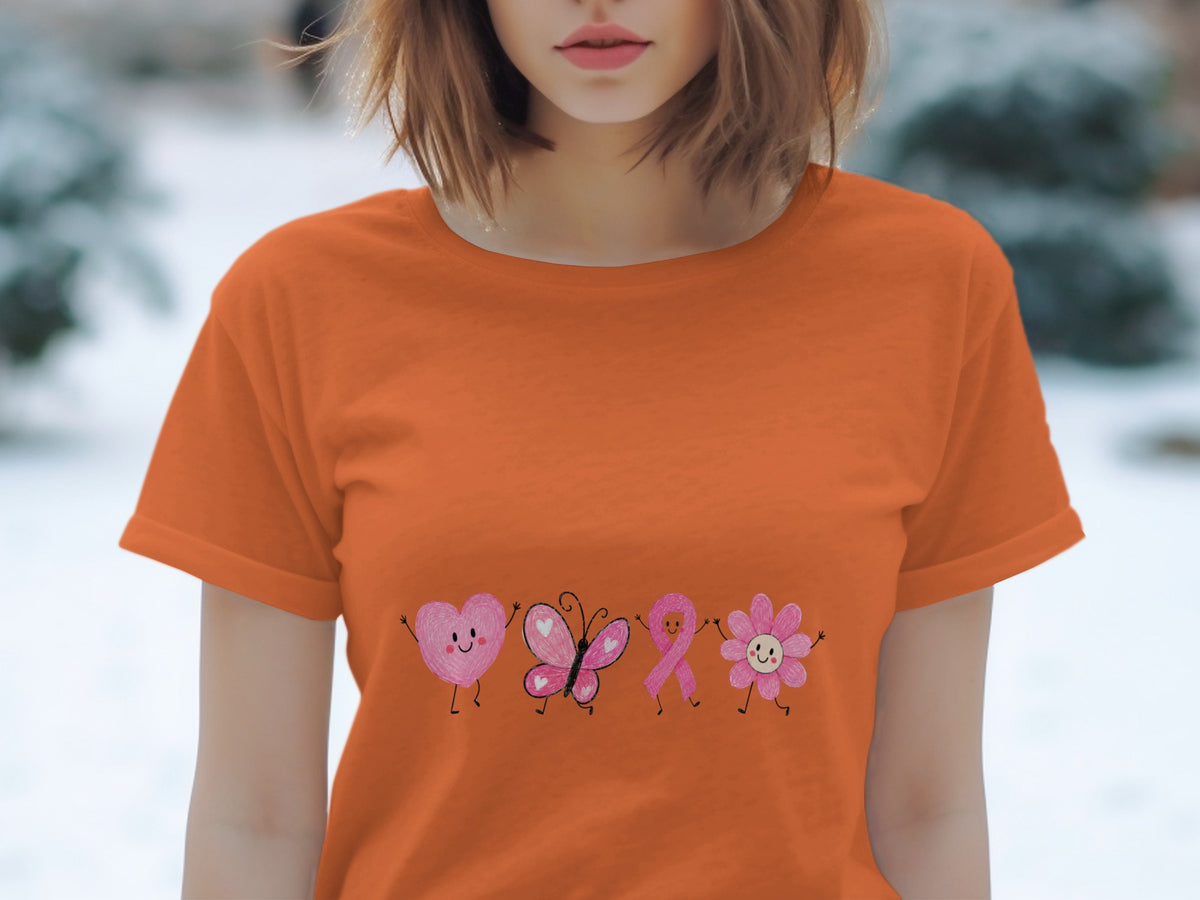 Orange t-shirt with cartoon heart, butterfly, ribbon, and flower designs.