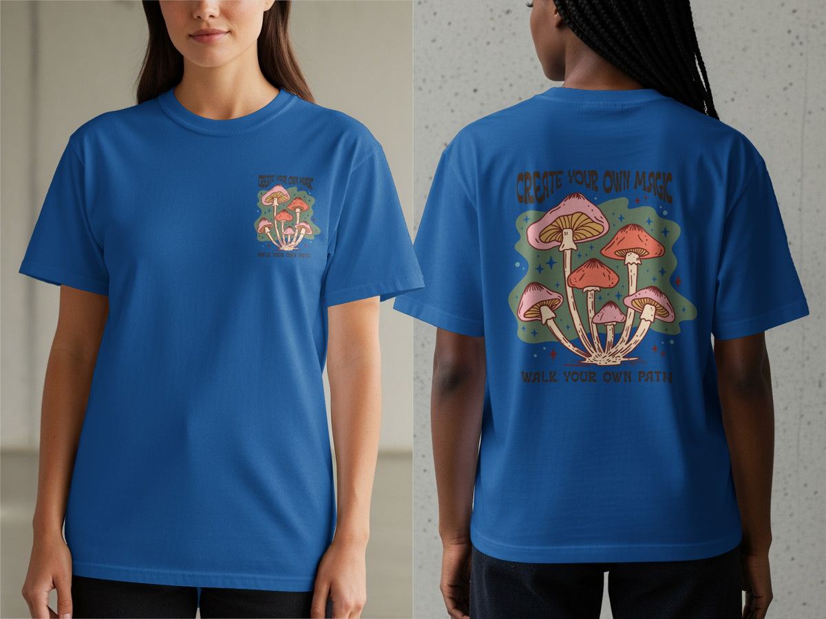 Blue t-shirt with mushroom graphic and text "Create Your Own Magic" and "Walk Your Own Path".
