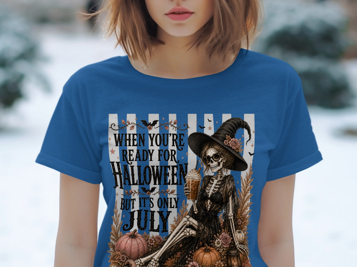 Skeleton witch with drink saying "When you're ready for Halloween but it's only July".