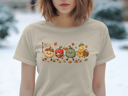 Cute fall characters on a light tan t-shirt with "Hello Fall" flag.
