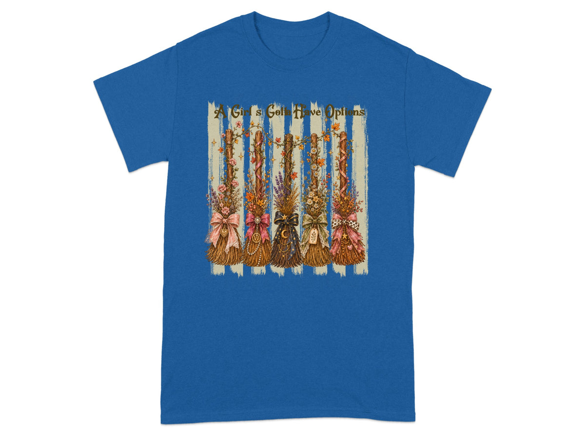 Graphic on blue t-shirt with text "A Girl's Gotta Have Options" and five decorative brooms.