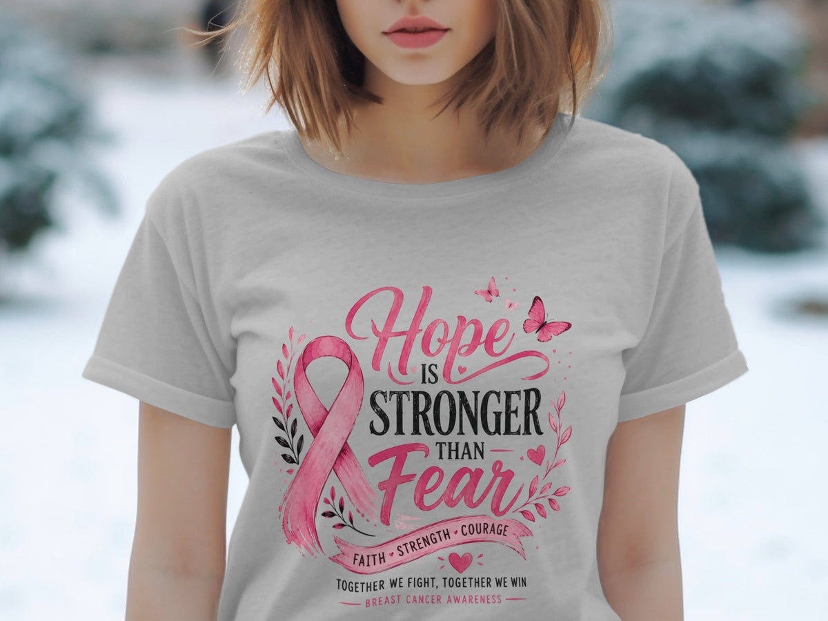 Gray t-shirt with "Hope is Stronger Than Fear" breast cancer awareness message.