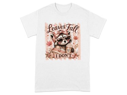 Cute raccoon in sunglasses holding pumpkin coffee, "Leaves Fall I Don't" text.